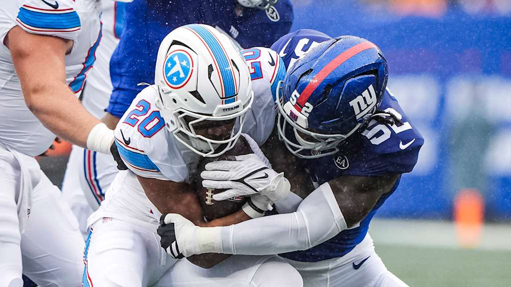 Giants Survive Titans in Sloppy Rain-Soaked Showdown 